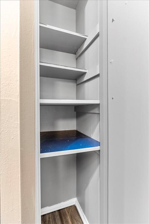 4859 Cedar Springs Road, Unit 241 Dallas, TX 75219 - Photo 28 of 38 a view of walk in closet with empty racks