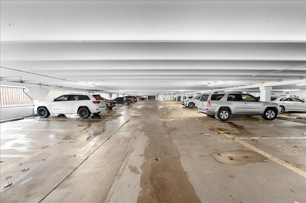 4859 Cedar Springs Road, Unit 241 Dallas, TX 75219 - Photo 32 of 38 a view of parking space with parked cars