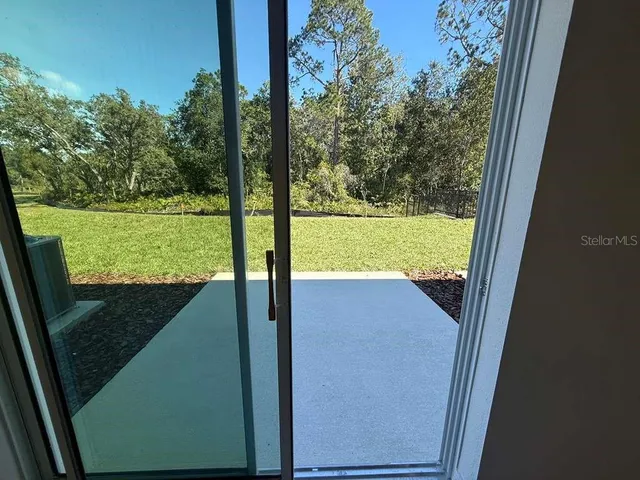 a view of yard from balcony