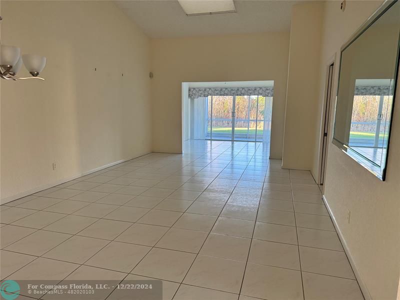 3727 Southwest Whispering Sound Drive Palm City, FL 34990 - Photo 11 of 29 a view of an empty room and window