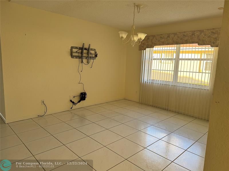 3727 Southwest Whispering Sound Drive Palm City, FL 34990 - Photo 12 of 29 a view of a room with windows