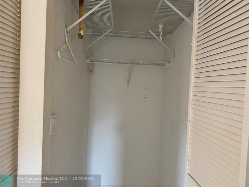 3727 Southwest Whispering Sound Drive Palm City, FL 34990 - Photo 13 of 29 close up of a white marble wall