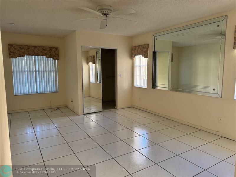 3727 Southwest Whispering Sound Drive Palm City, FL 34990 - Photo 16 of 29 a view of an empty room and window