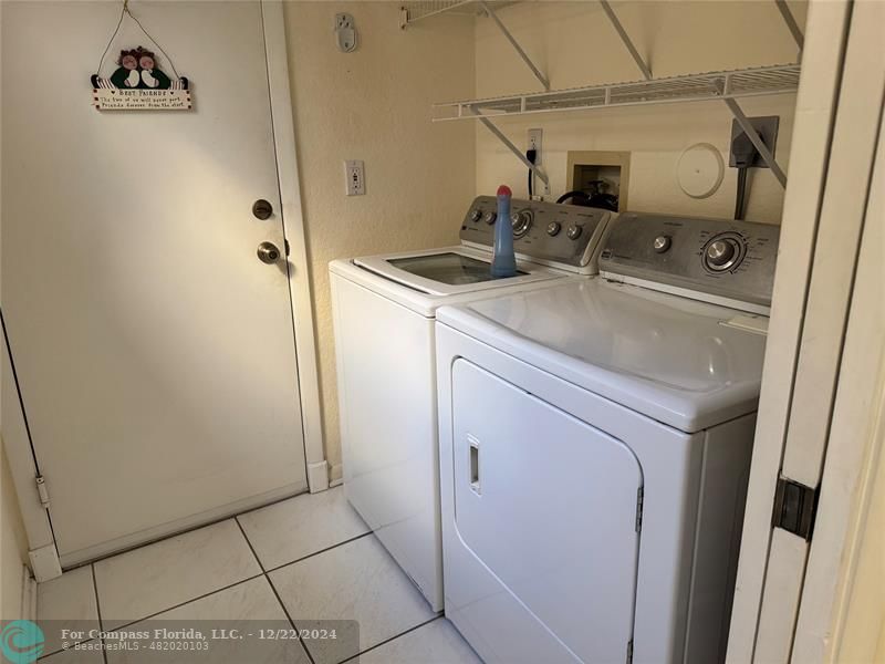 3727 Southwest Whispering Sound Drive Palm City, FL 34990 - Photo 29 of 29 a bathroom with a sink and mirror