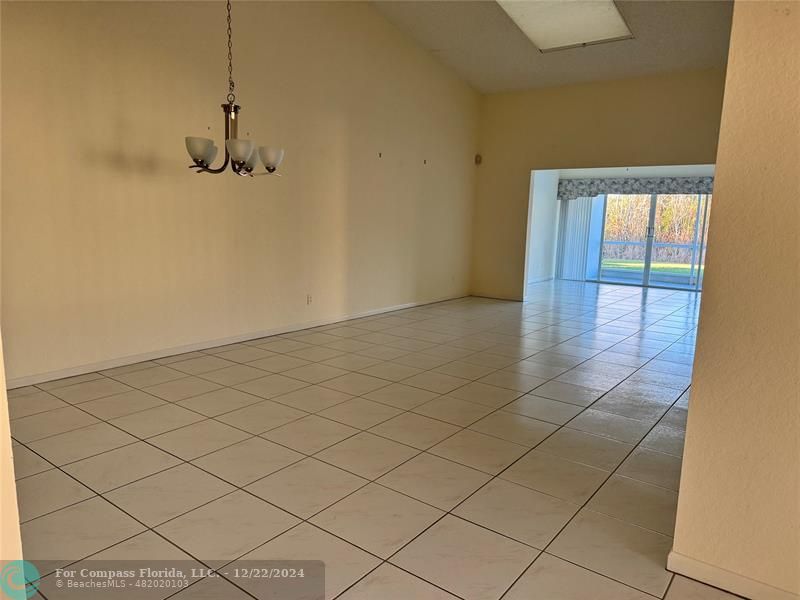 3727 Southwest Whispering Sound Drive Palm City, FL 34990 - Photo 10 of 29 a view of a room and window