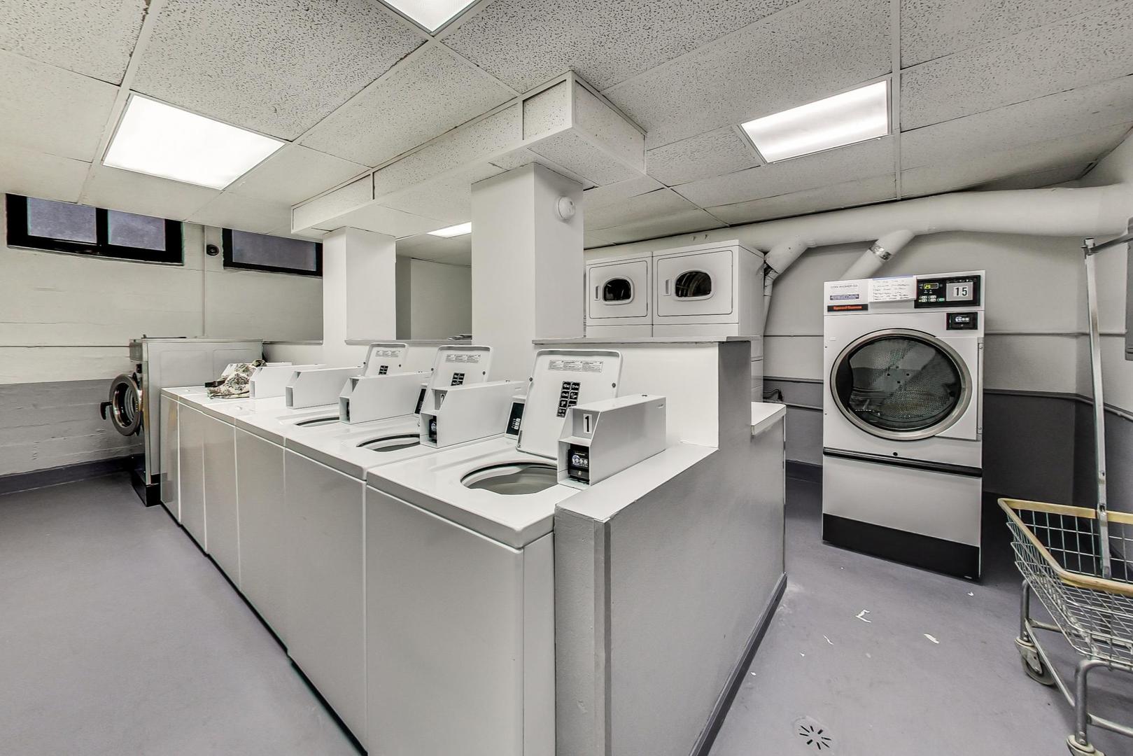 6101 North Sheridan Road, Unit 6H Chicago, IL 60660 - Photo 21 of 29 a utility room with dryer washer and stair
