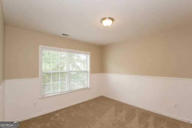 an empty room with a window