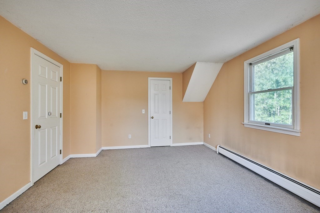 5 Thrasher Hill Road Worthington, MA 01098 - Photo 15 of 39 a view of an empty room with a window