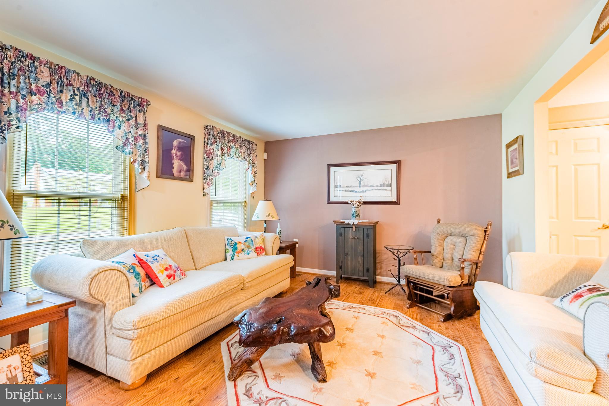 9679 Baltimore Avenue Laurel, MD 20723 - Photo 27 of 56 a living room with furniture and a large window