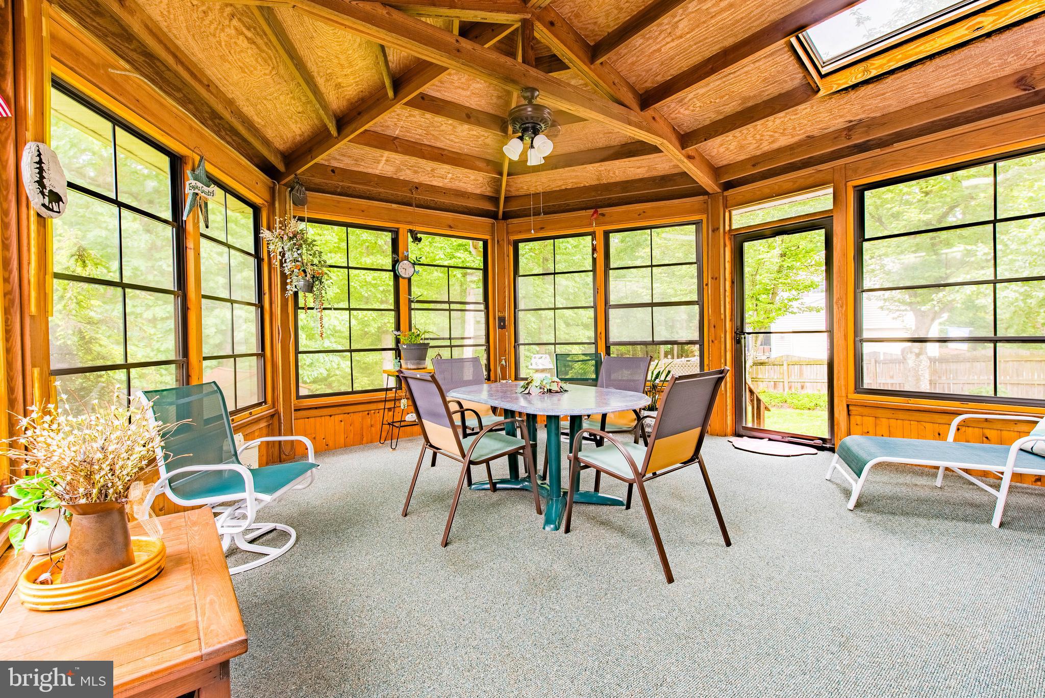 9679 Baltimore Avenue Laurel, MD 20723 - Photo 34 of 56 a dining room with furniture and a large window