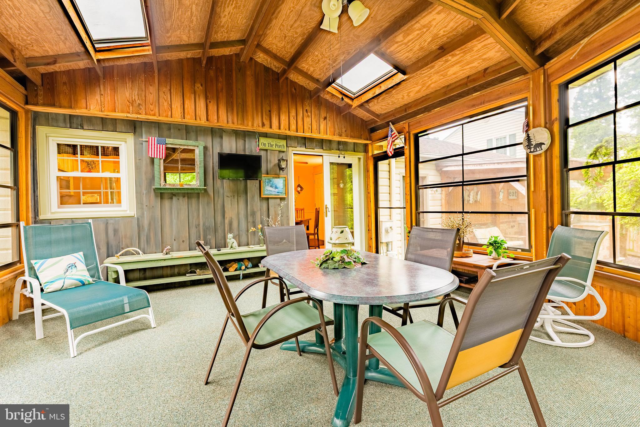 9679 Baltimore Avenue Laurel, MD 20723 - Photo 35 of 56 a dining room with furniture and window