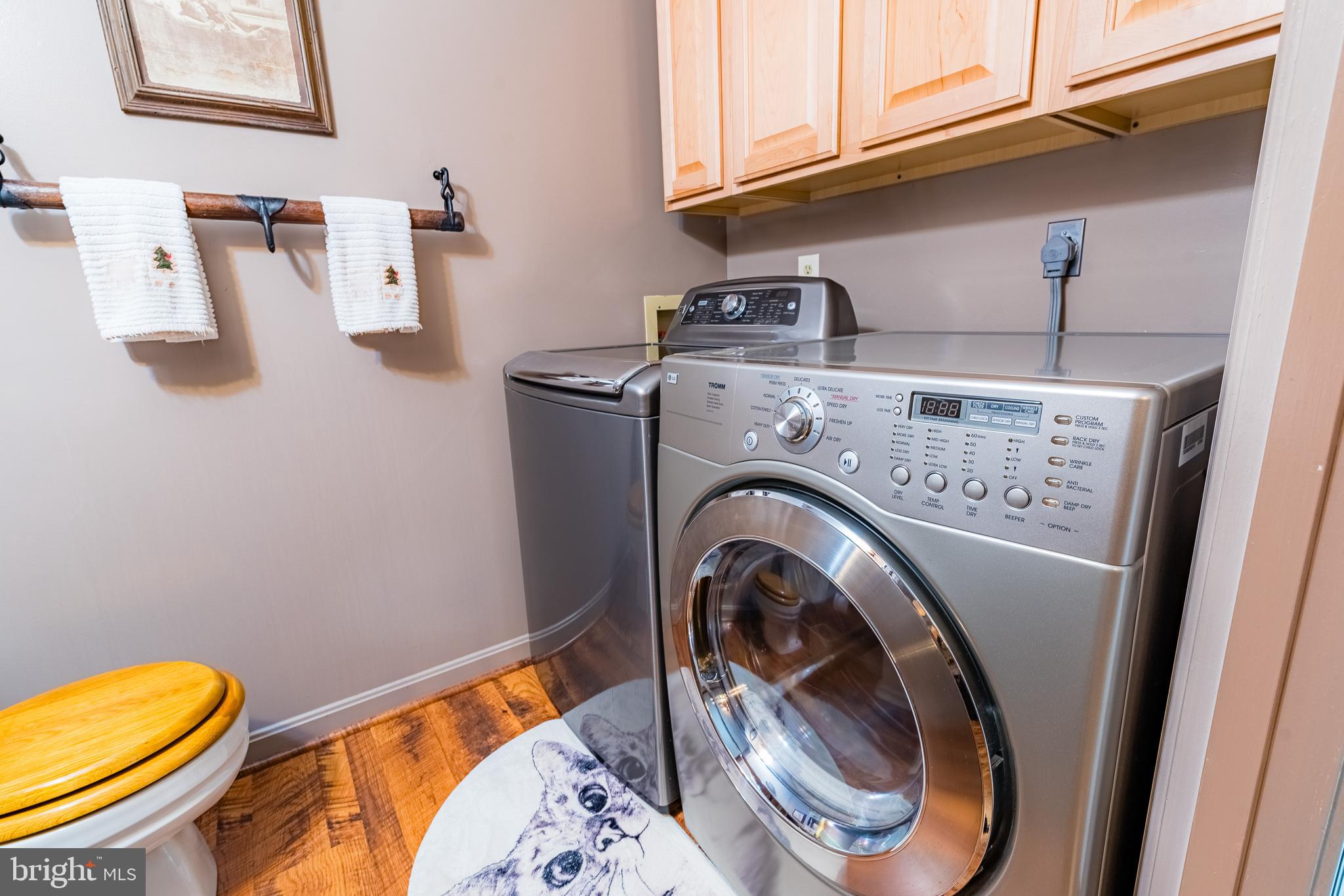 9679 Baltimore Avenue Laurel, MD 20723 - Photo 49 of 56 a utility room with dryer and washer