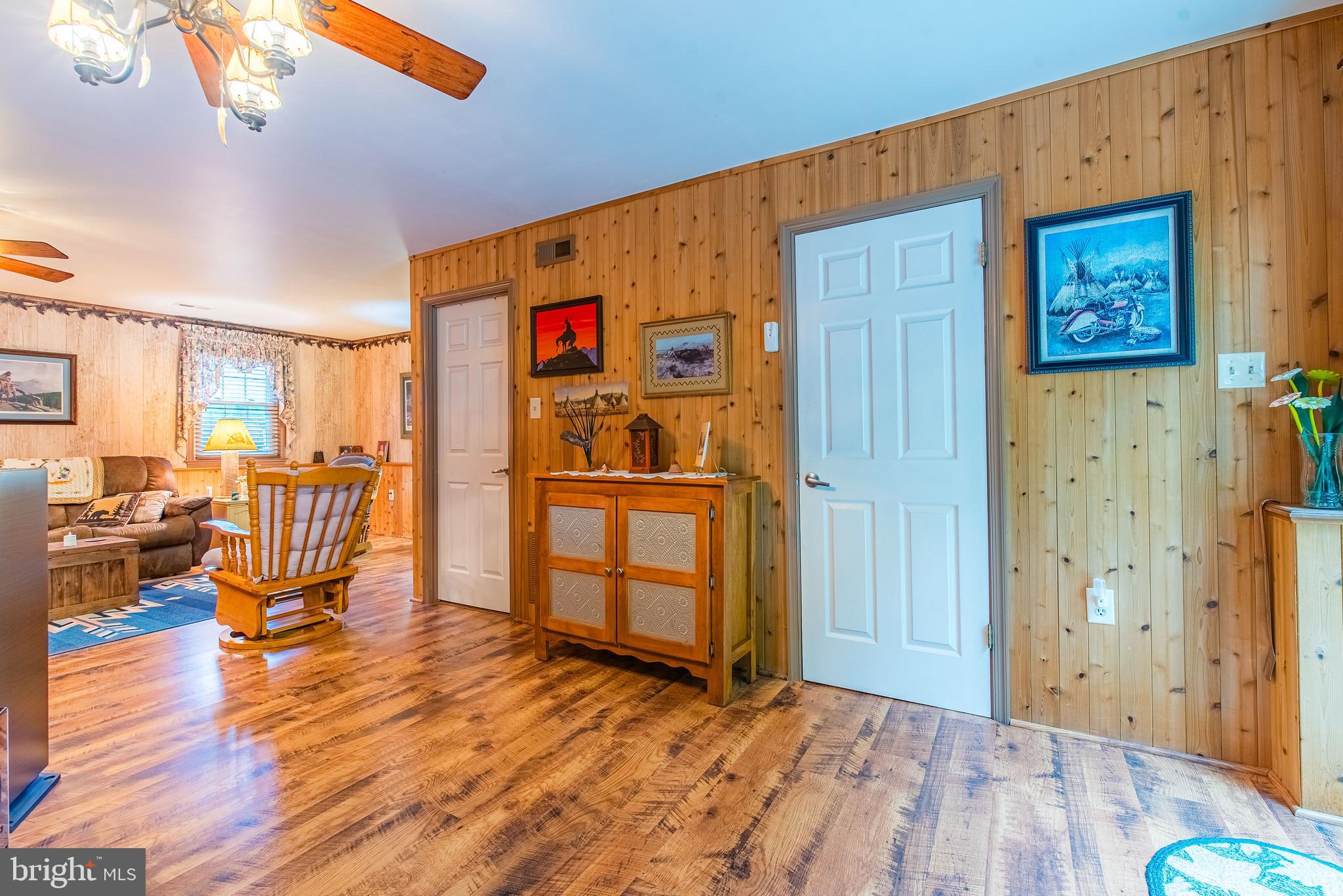 9679 Baltimore Avenue Laurel, MD 20723 - Photo 50 of 56 a view of dining room with wooden floor