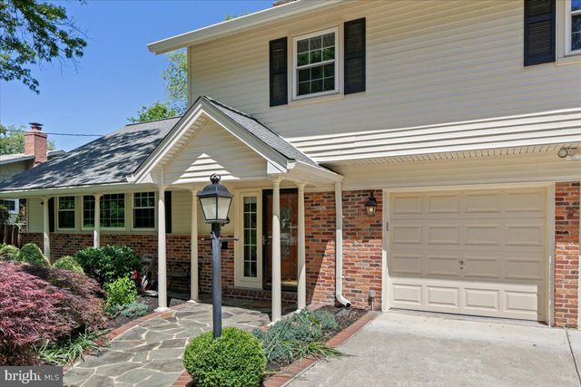 a front view of a house with a porch