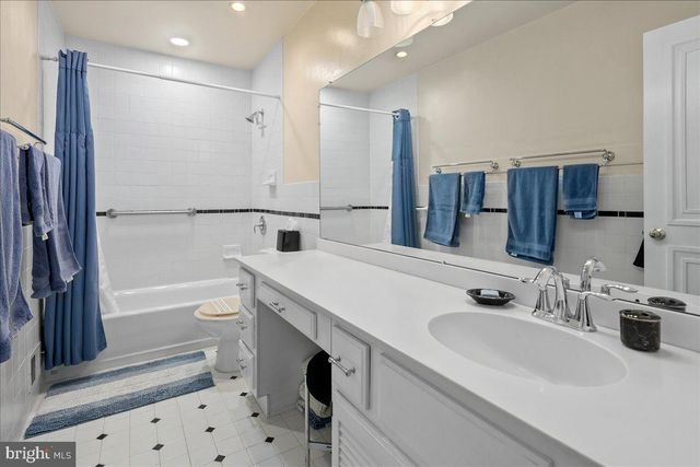 a view of a lake with a tree