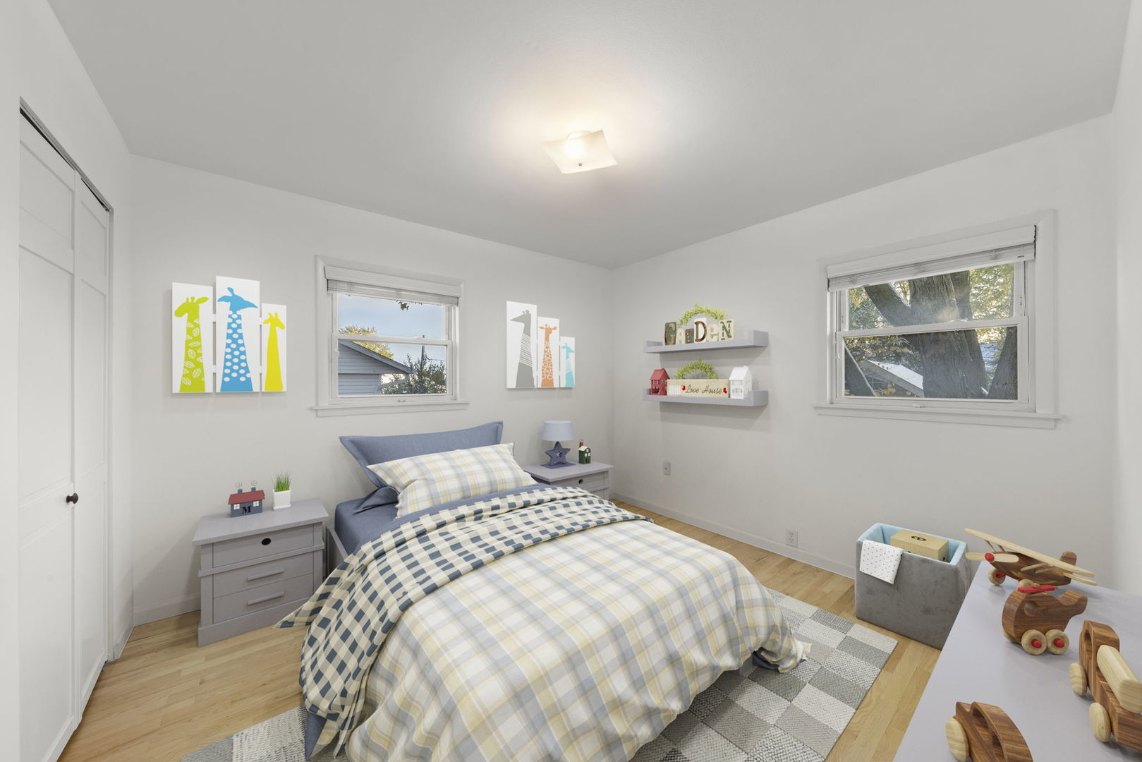 710 Cascade Avenue Romeoville, IL 60446 - Photo 11 of 25 a bedroom with a bed and wooden floor