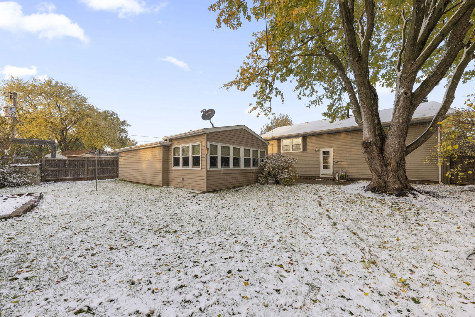 710 Cascade Avenue Romeoville, IL 60446 - Photo 24 of 25 a front view of a house with a garden