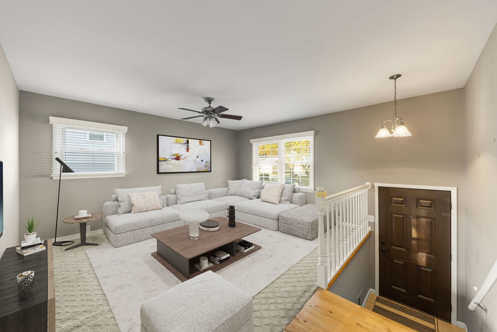 710 Cascade Avenue Romeoville, IL 60446 - Photo 4 of 25 a living room with furniture and a ceiling fan