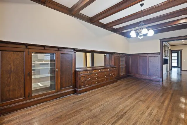 a kitchen with a stove a sink and a refrigerator
