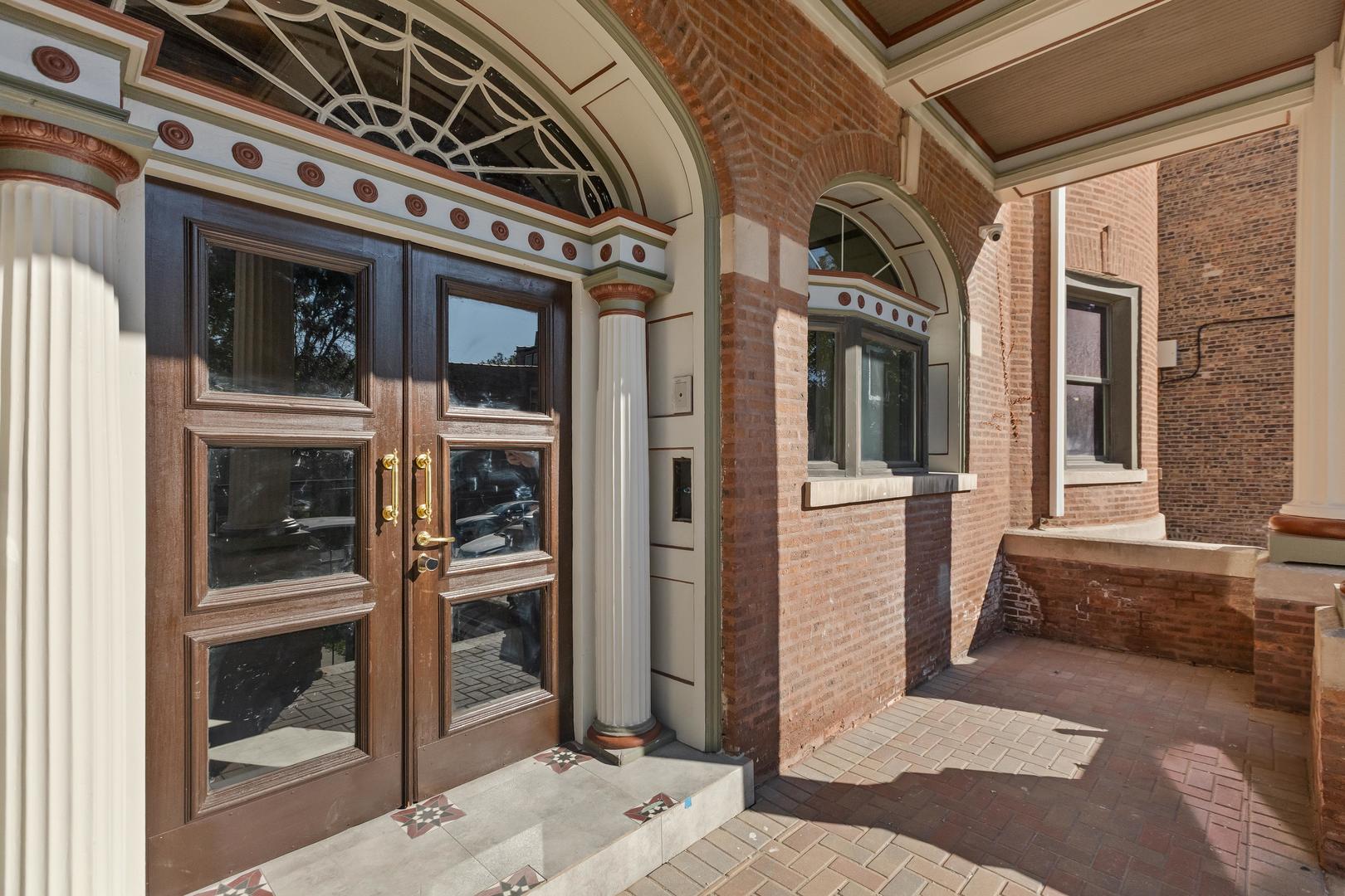 446 East 48th Street, Unit 3E Chicago, IL 60615 - Photo 6 of 33 a view of a porch with a door and balcony