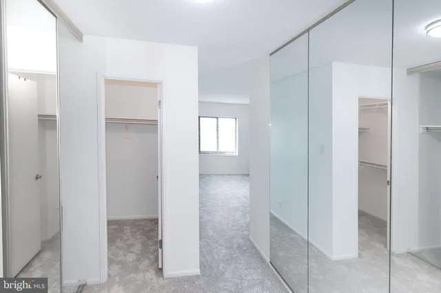 a bathroom with bathtub and shower