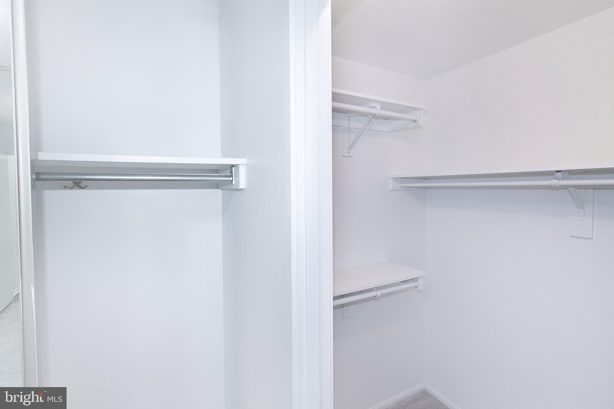 307 Yoakum Parkway, Unit 1024 Alexandria, VA 22304 - Photo 31 of 50 a view of walk in closet with empty racks