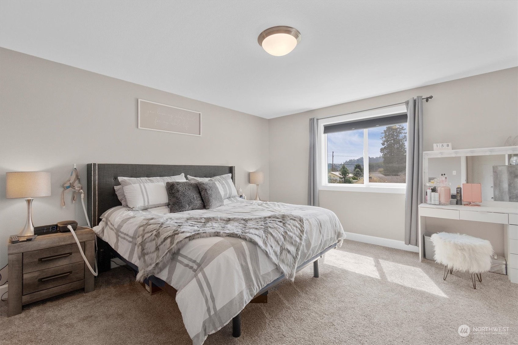 4768 Pacific Way Longview, WA 98632 - Photo 18 of 25 a bedroom with bed and a window