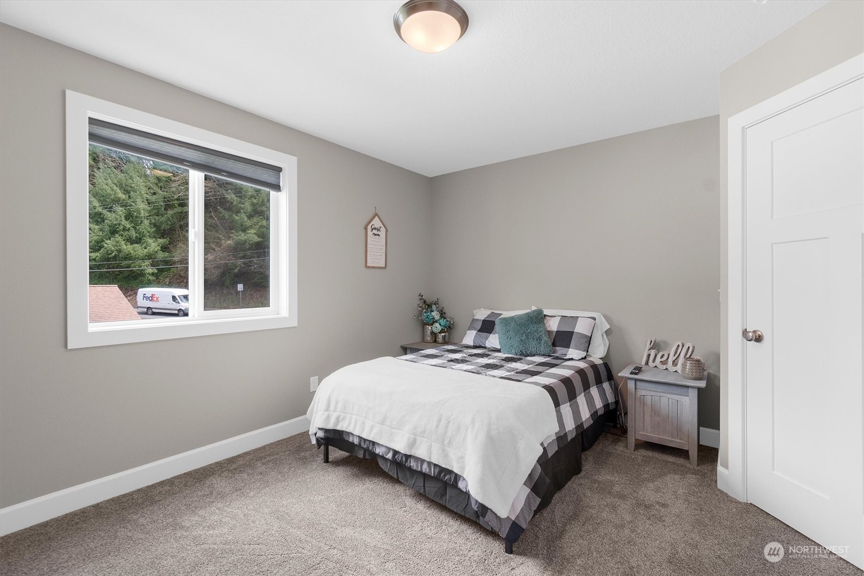 4768 Pacific Way Longview, WA 98632 - Photo 23 of 25 a bedroom with a bed and window