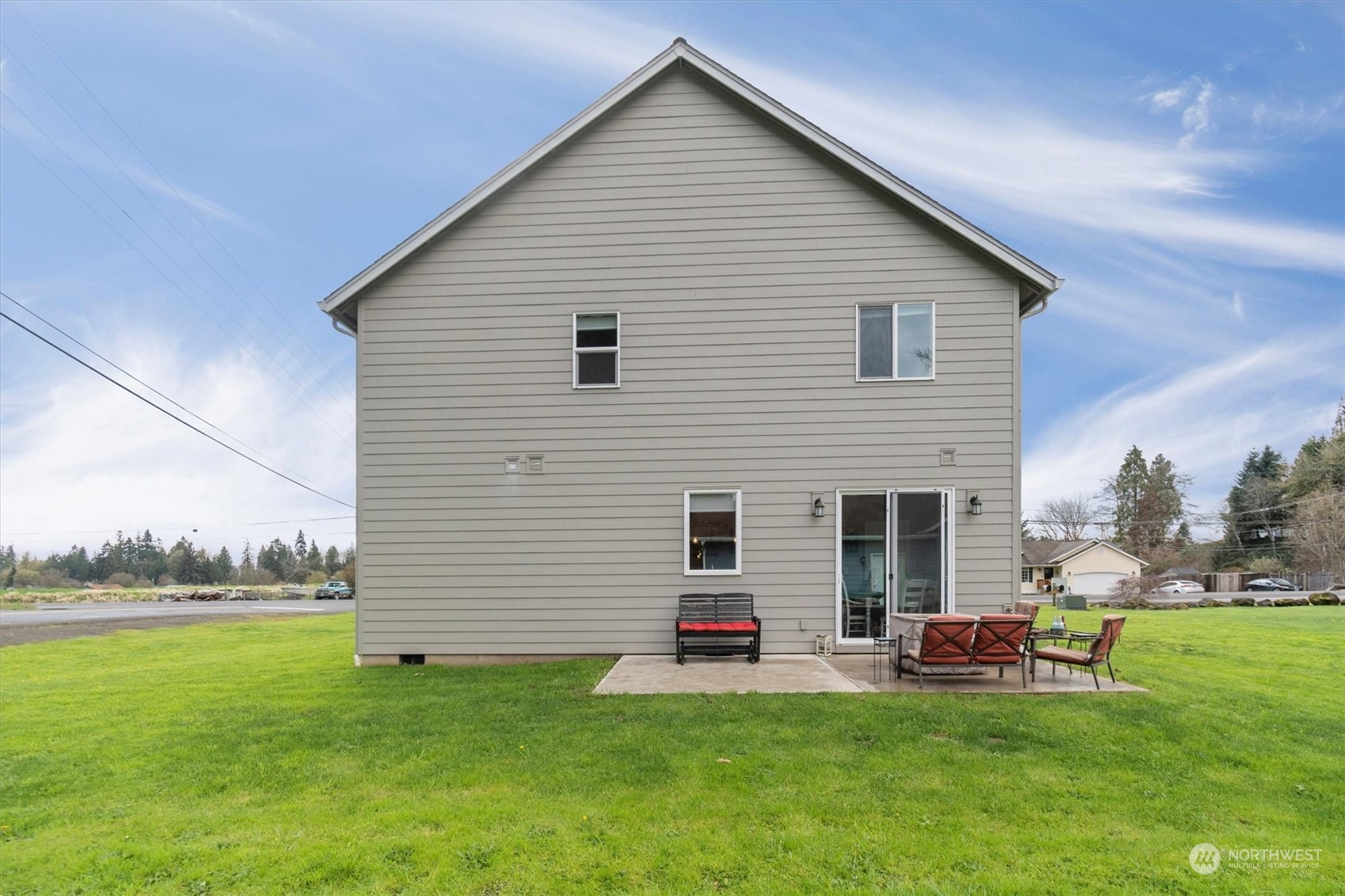 4768 Pacific Way Longview, WA 98632 - Photo 25 of 25 a view of a house with a backyard and chairs