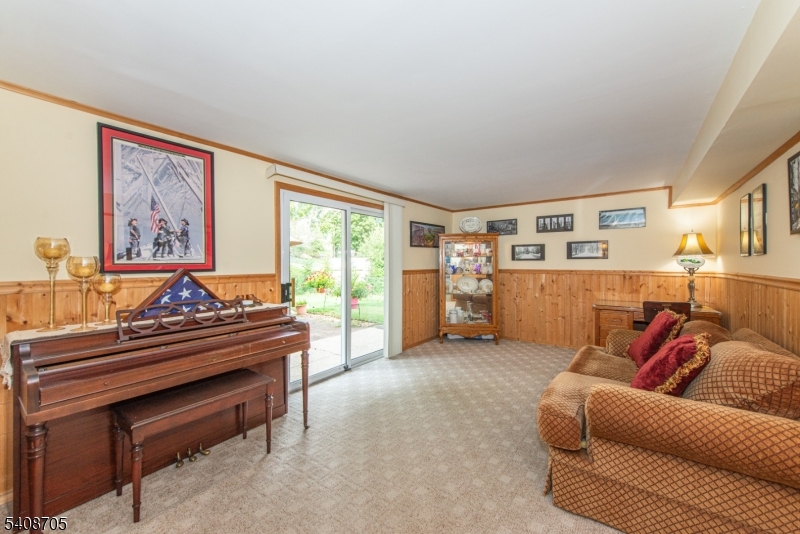 4 George Street Succasunna, NJ 07876 - Photo 12 of 34 a living room with furniture and a piano