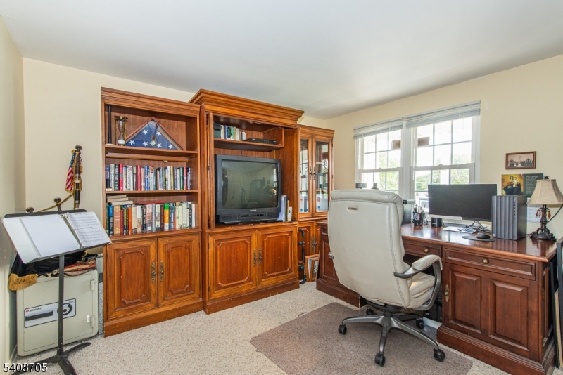 4 George Street Succasunna, NJ 07876 - Photo 23 of 34 a view of a workspace with furniture and a window