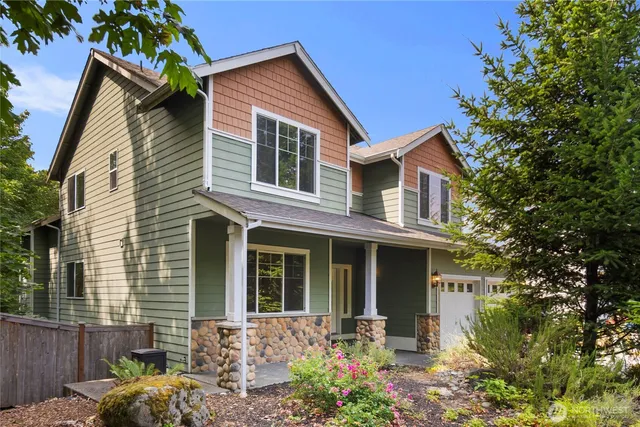 front view of a house with a yard