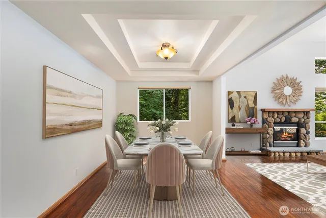 a dining room with furniture and window