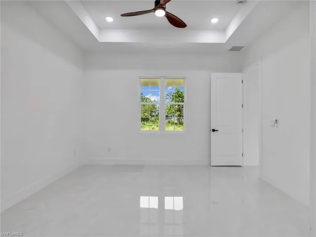 an empty room with windows