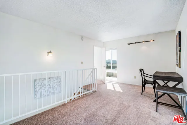 a view of a room with furniture window and wooden floor