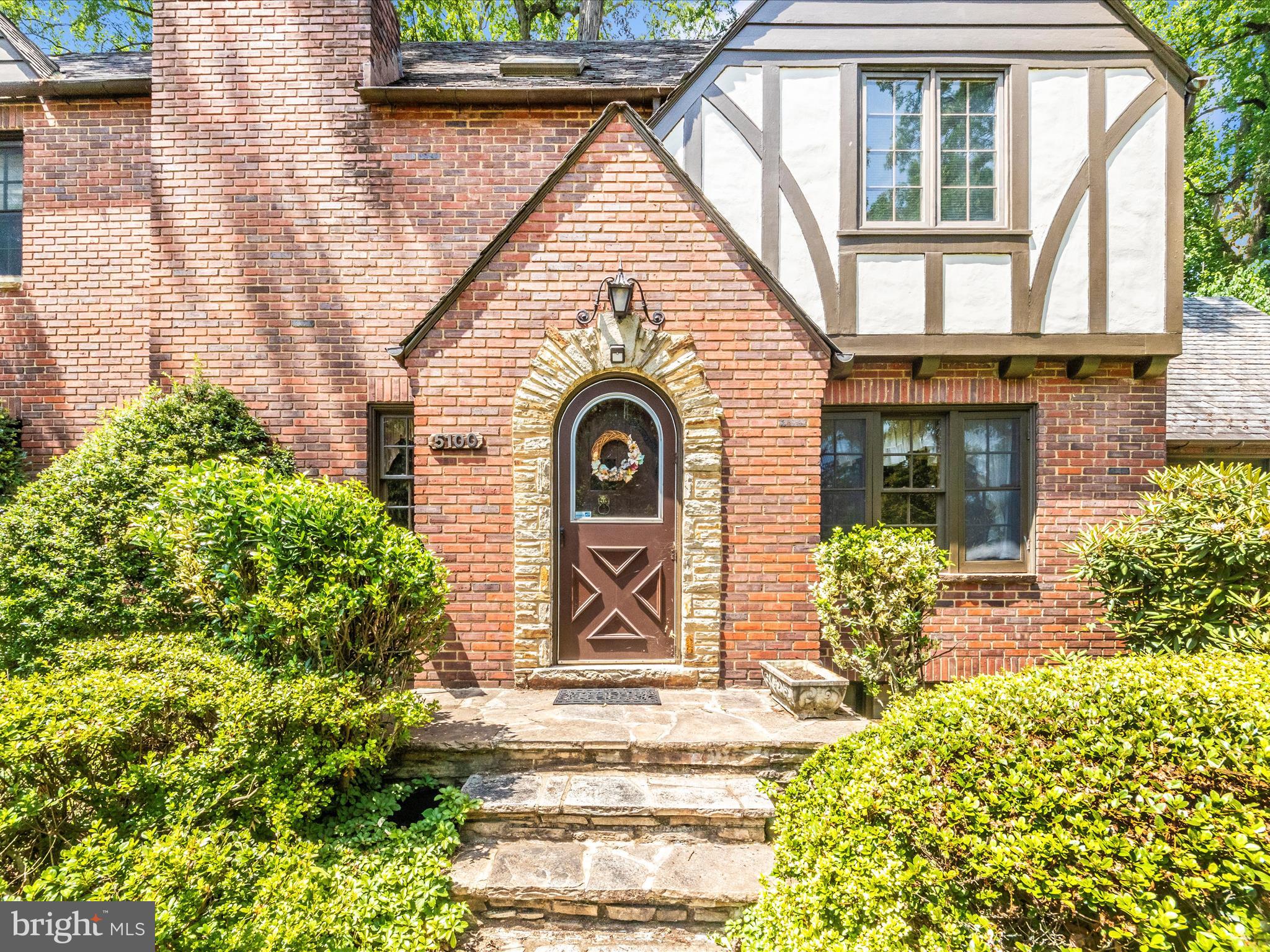 5100 Brook Green Road Baltimore, MD 21229 - Photo 3 of 54 a view of a house with potted plants