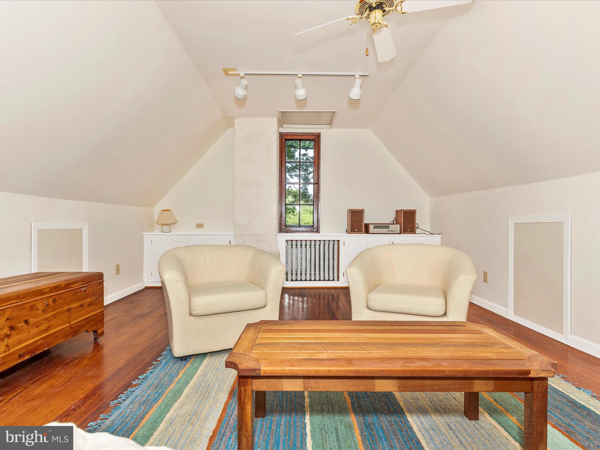 5100 Brook Green Road Baltimore, MD 21229 - Photo 38 of 54 a bedroom with two beds and a couch