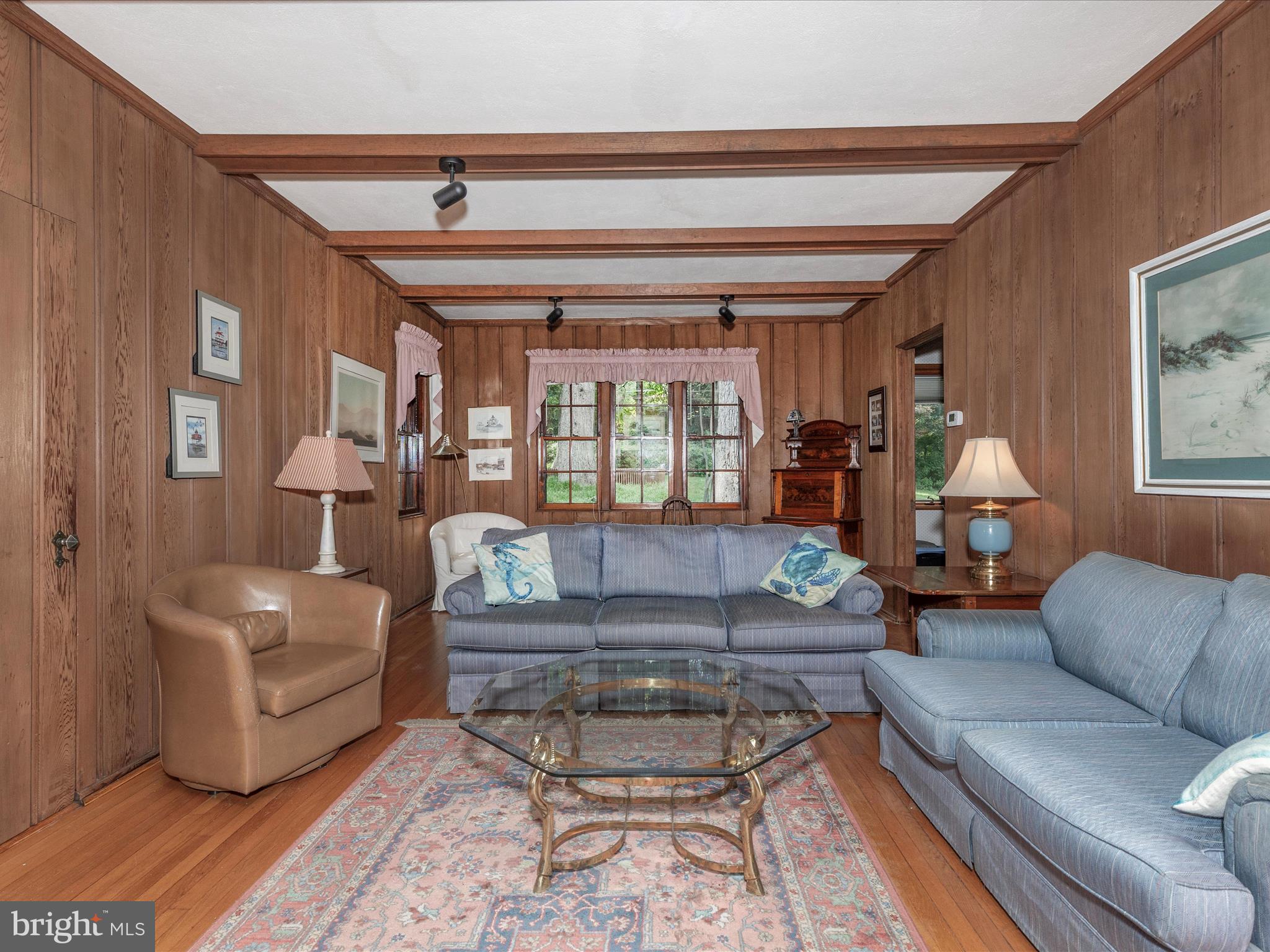 5100 Brook Green Road Baltimore, MD 21229 - Photo 5 of 54 a living room with furniture and a large window