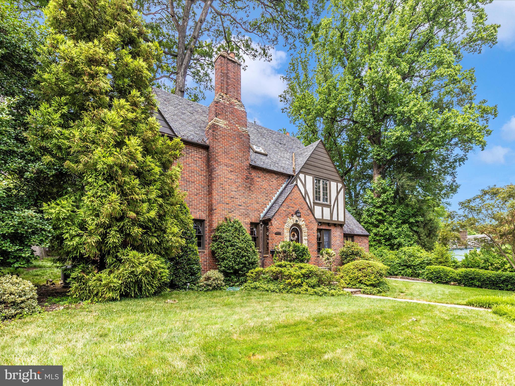 5100 Brook Green Road Baltimore, MD 21229 - Photo 53 of 54 a front view of a house with a yard