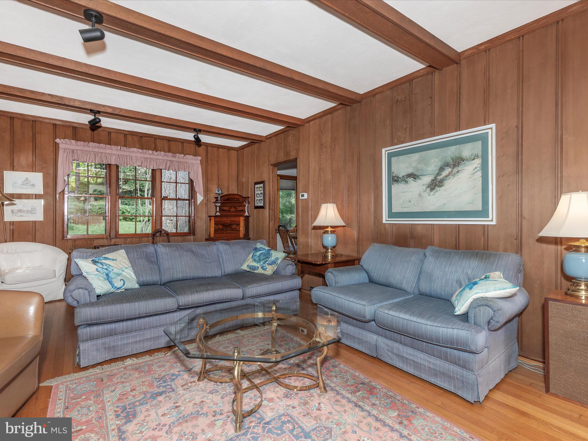 5100 Brook Green Road Baltimore, MD 21229 - Photo 6 of 54 a living room with furniture and a large window