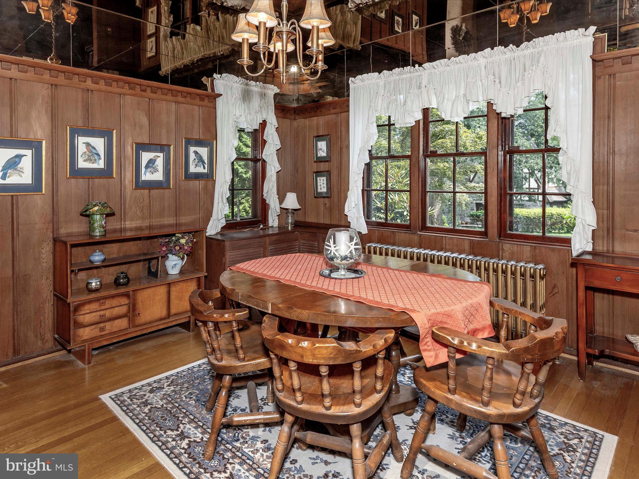 5100 Brook Green Road Baltimore, MD 21229 - Photo 9 of 54 a dining room with furniture and window
