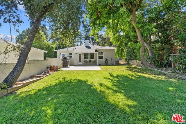 a view of a house with a big yard