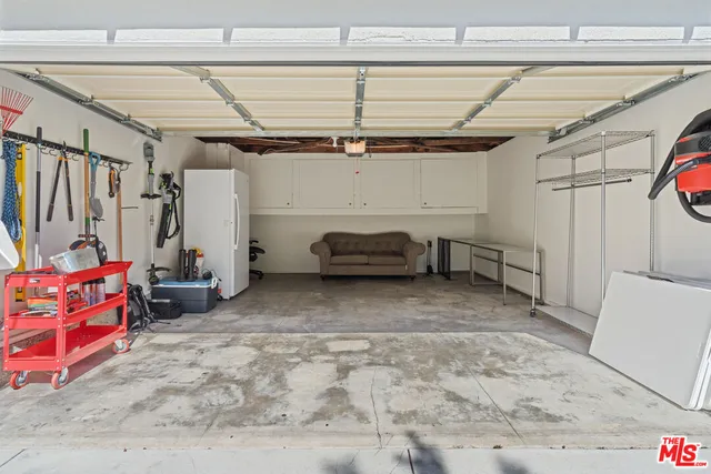 front view of a house with a garden