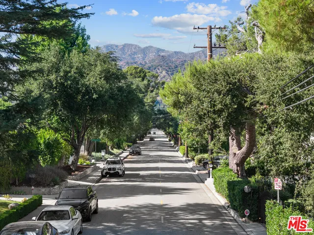 an aerial view of residential house and green space