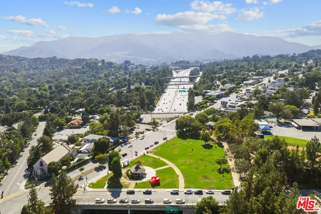 an aerial view of residential house with outdoor space