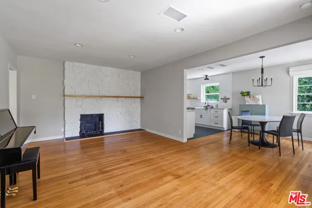 a view of a kitchen and dining room
