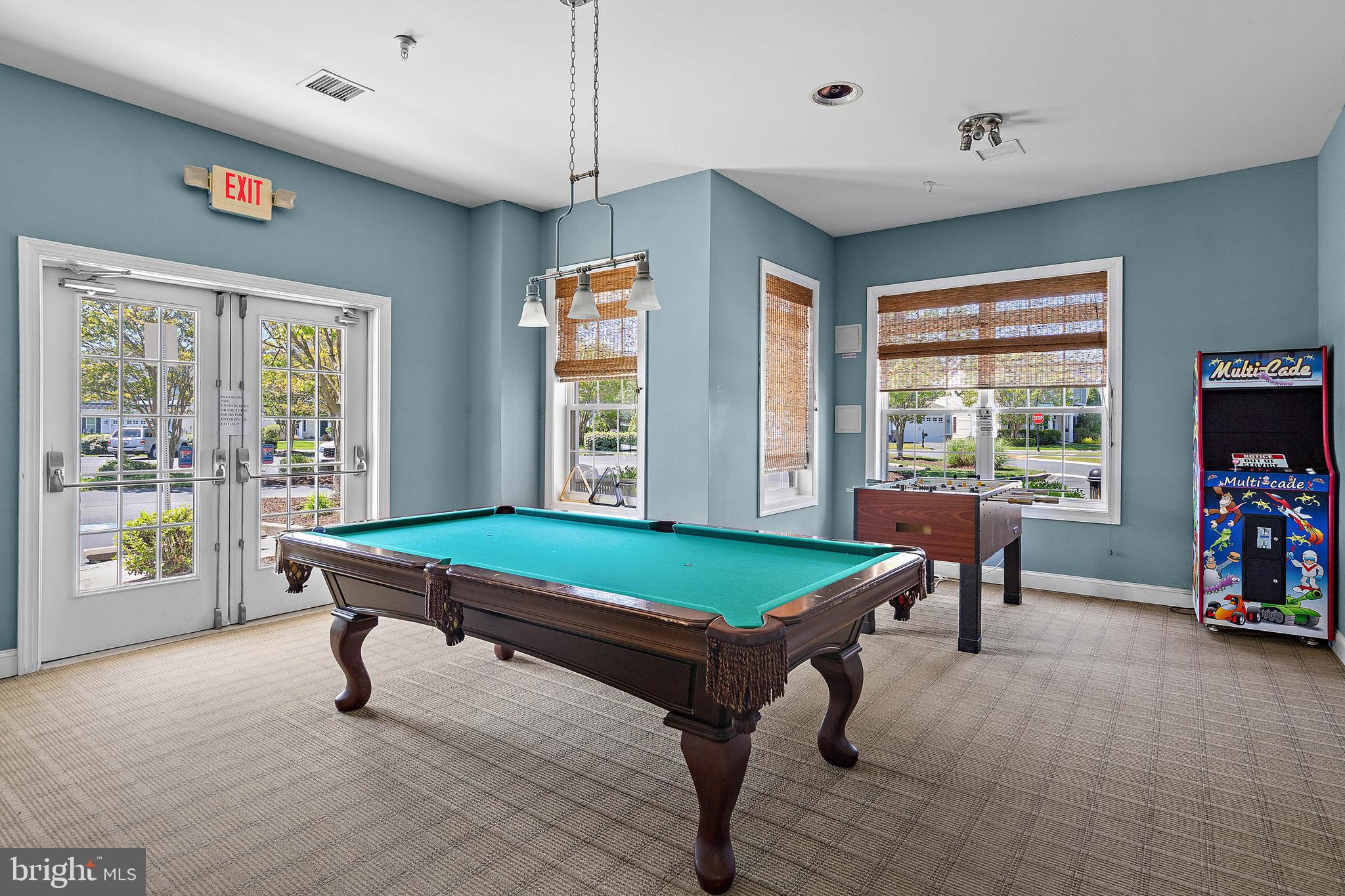 12159 Snug Harbor Road Berlin, MD 21811 - Photo 62 of 72 a room with pool table and windows