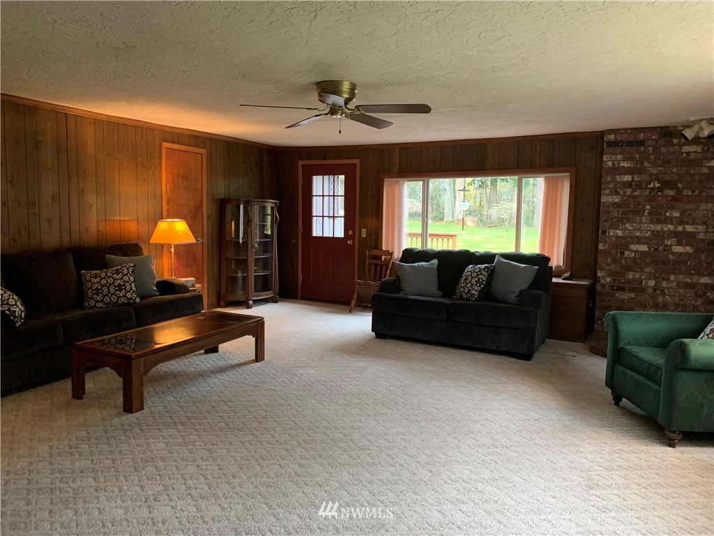 106 Pattee Road Chehalis, WA 98532 - Photo 12 of 33 a living room with furniture and a fireplace