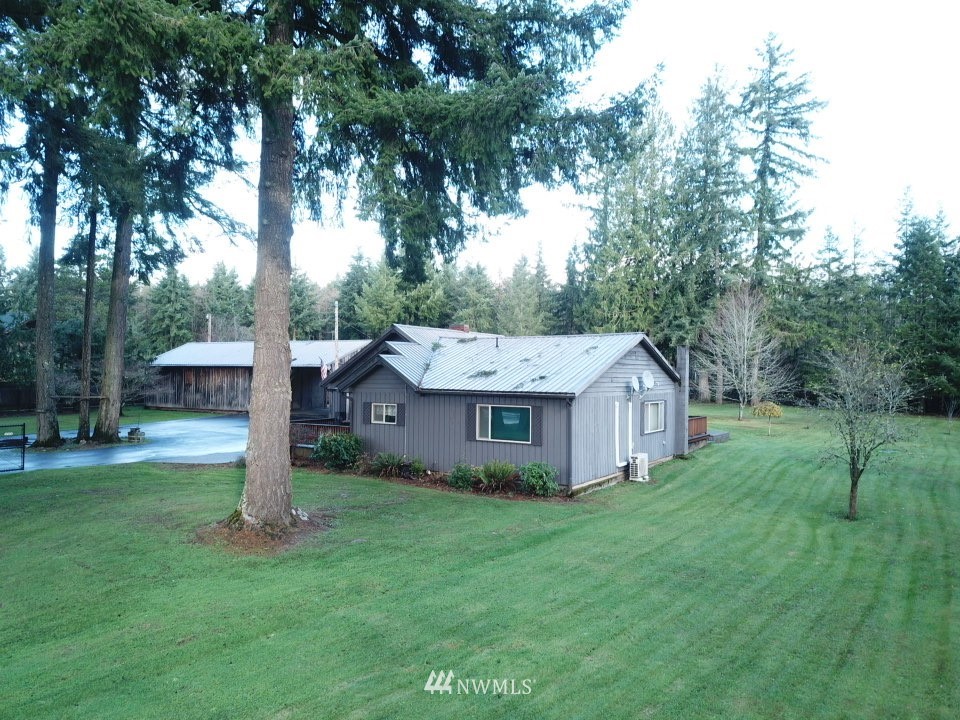 106 Pattee Road Chehalis, WA 98532 - Photo 24 of 33 a view of a house with backyard and a tree