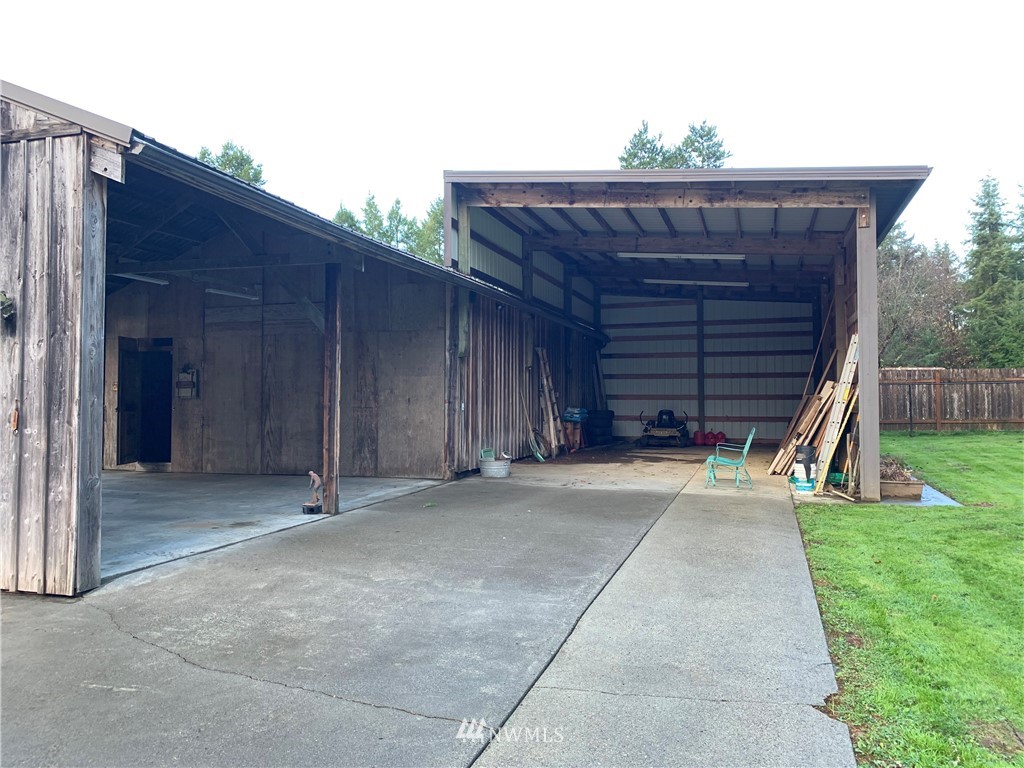 106 Pattee Road Chehalis, WA 98532 - Photo 26 of 33 a view of an house with backyard and wooden fence